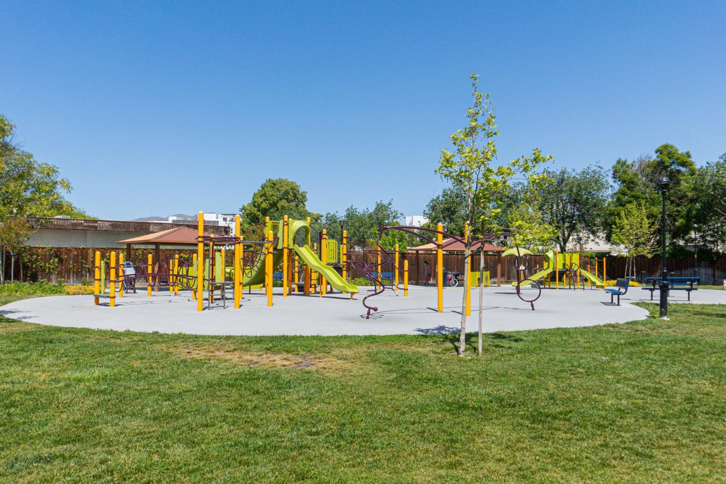 1926 Trento Loop Milpitas, CA 95035 - Photo 40 of 43 a view of a park with swings and slides