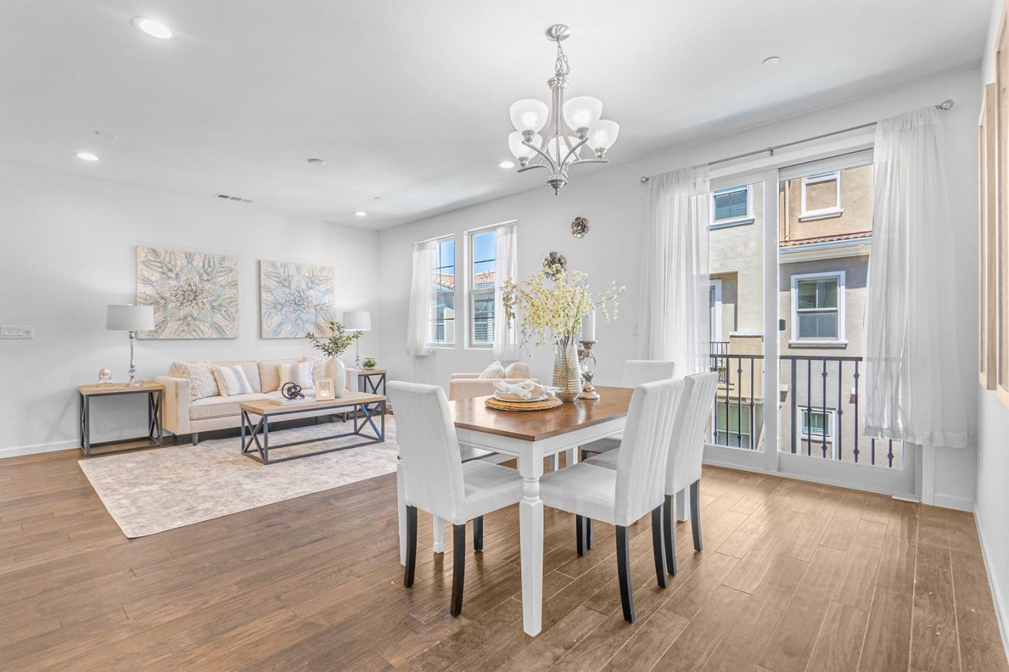 1926 Trento Loop Milpitas, CA 95035 - Photo 6 of 43 a view of a dining room with furniture window and wooden floor