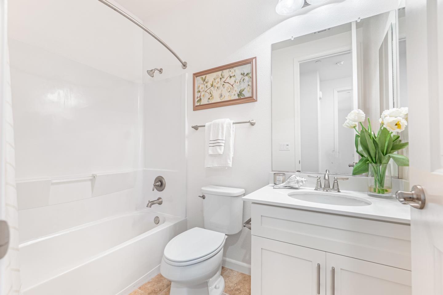 1926 Trento Loop Milpitas, CA 95035 - Photo 10 of 43 a bathroom with a sink a toilet and shower