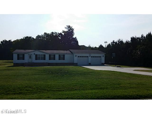 3165 New Cut Road Lexington, NC 27292 - Photo 1 of 16 Exterior Front. BEAUTIFUL SUMMER LAWN.
