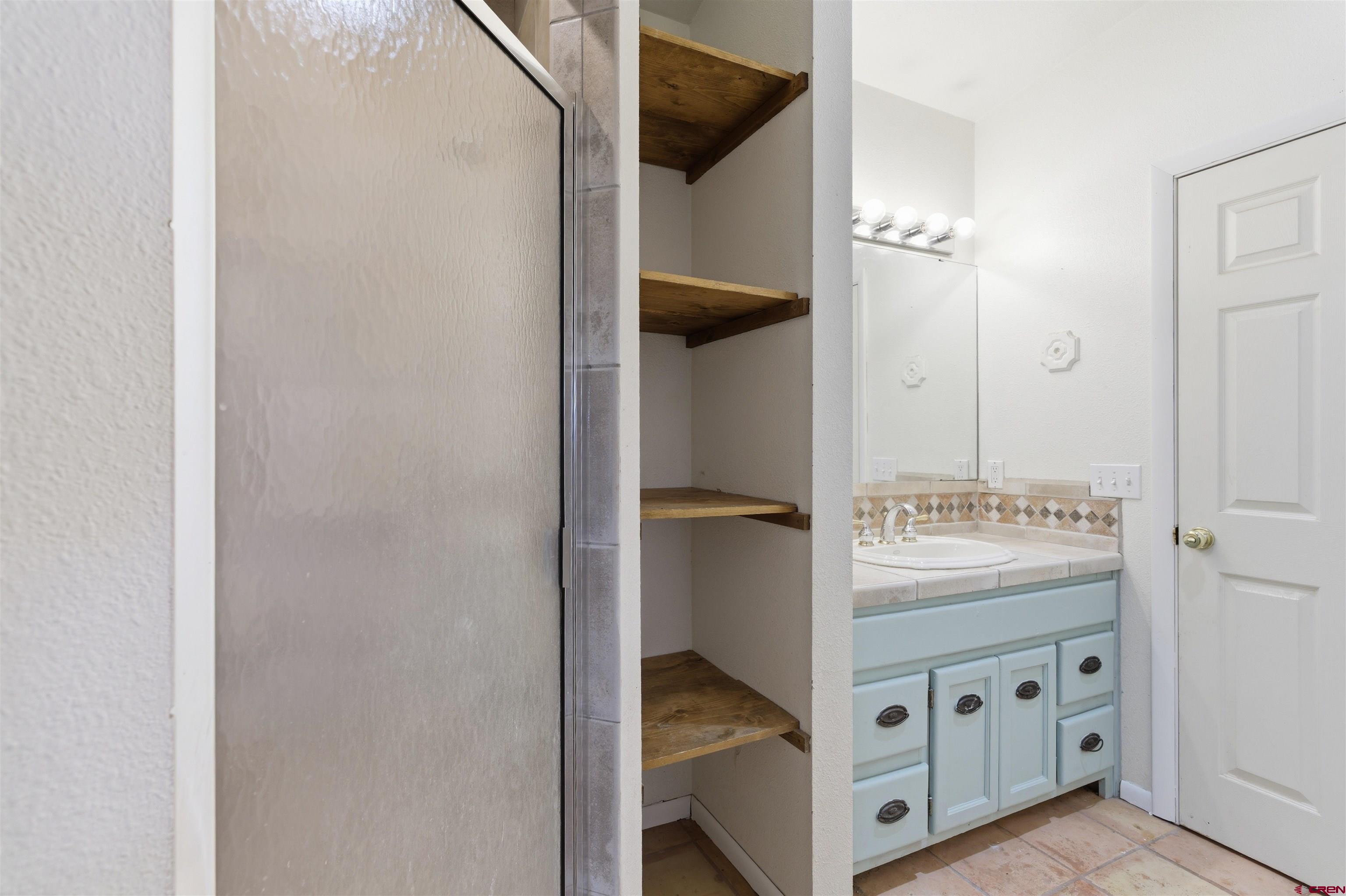 16216 2600th Road Cedaredge, CO 81413 - Photo 15 of 45 a view of an entryway with cabinet