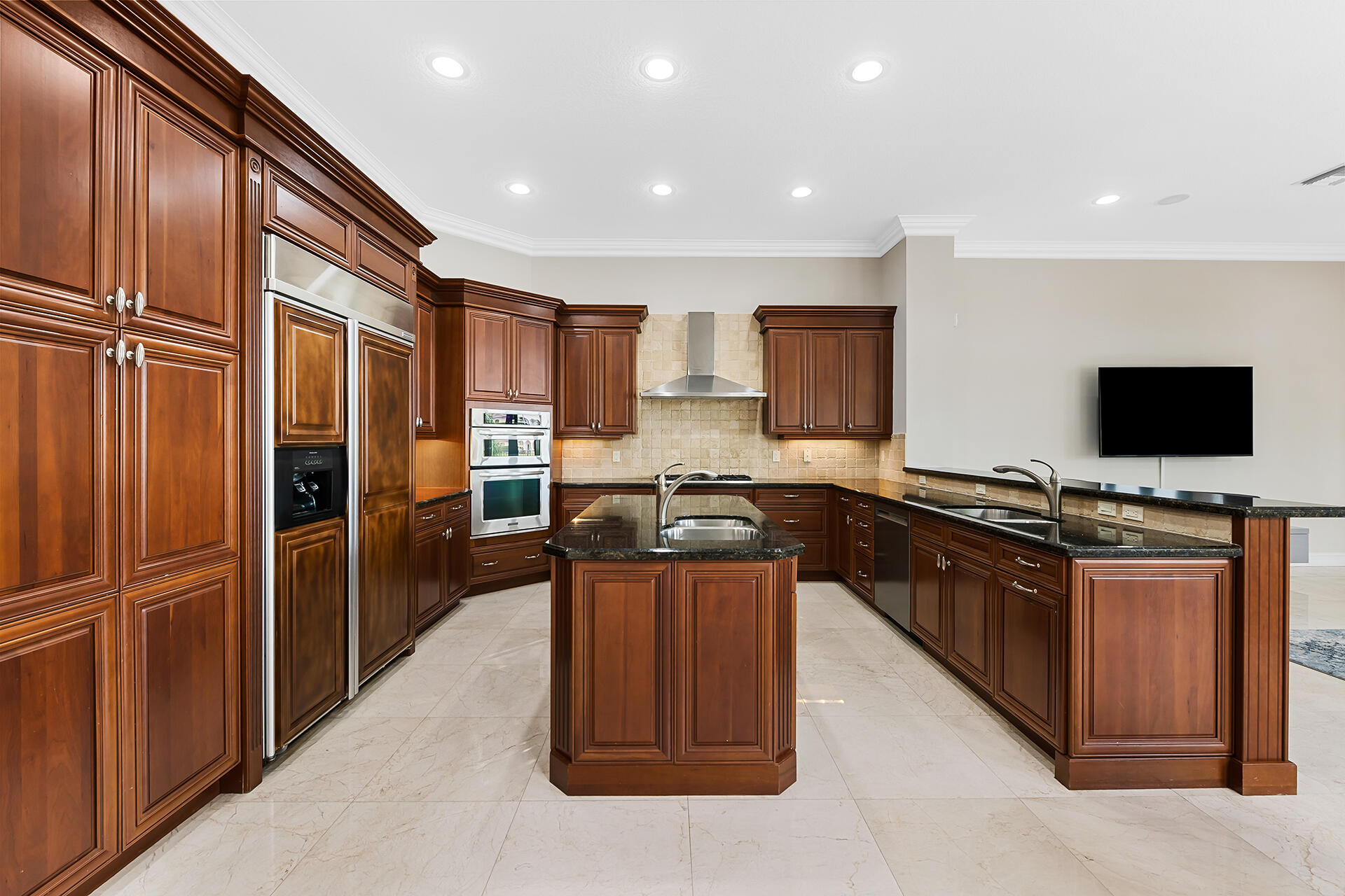 17895 Cadena Drive Boca Raton, FL 33496 - Photo 13 of 68 a kitchen with stainless steel appliances granite countertop a stove refrigerator and a microwave