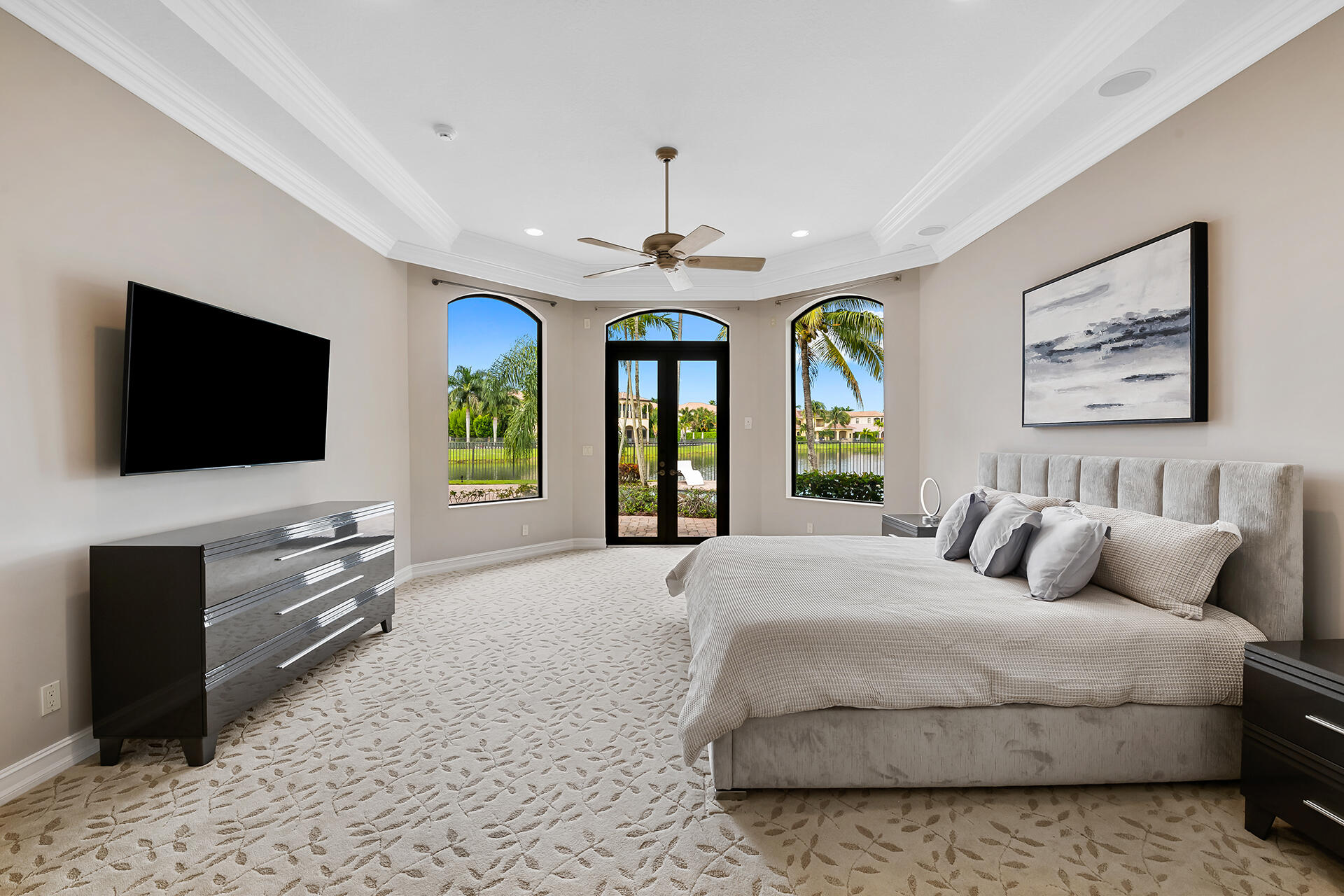 17895 Cadena Drive Boca Raton, FL 33496 - Photo 21 of 68 a bedroom with a bed and a flat screen television