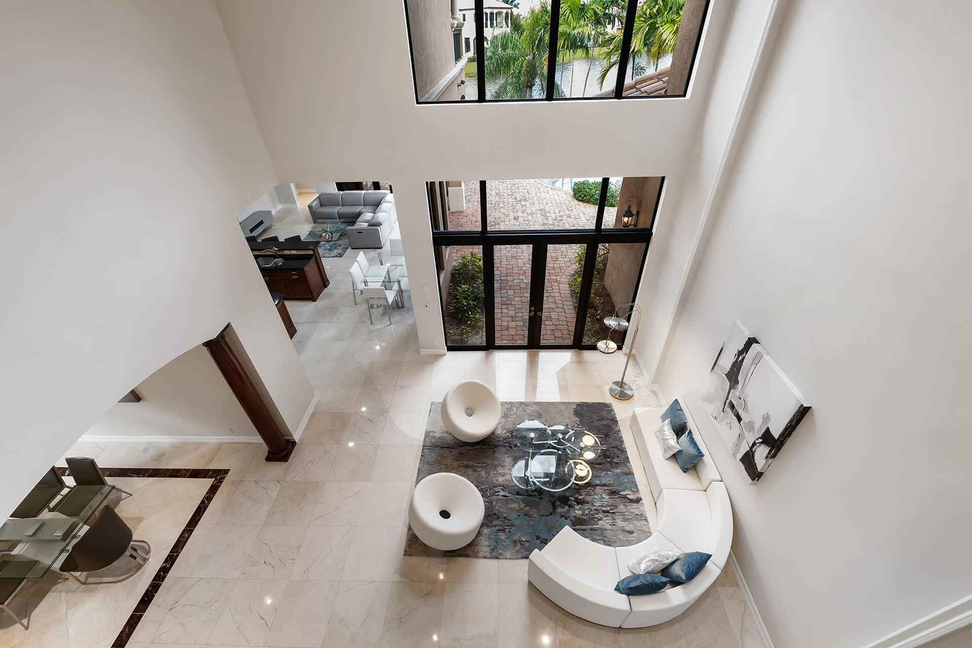 17895 Cadena Drive Boca Raton, FL 33496 - Photo 34 of 68 a view of entryway and hall with wooden floor