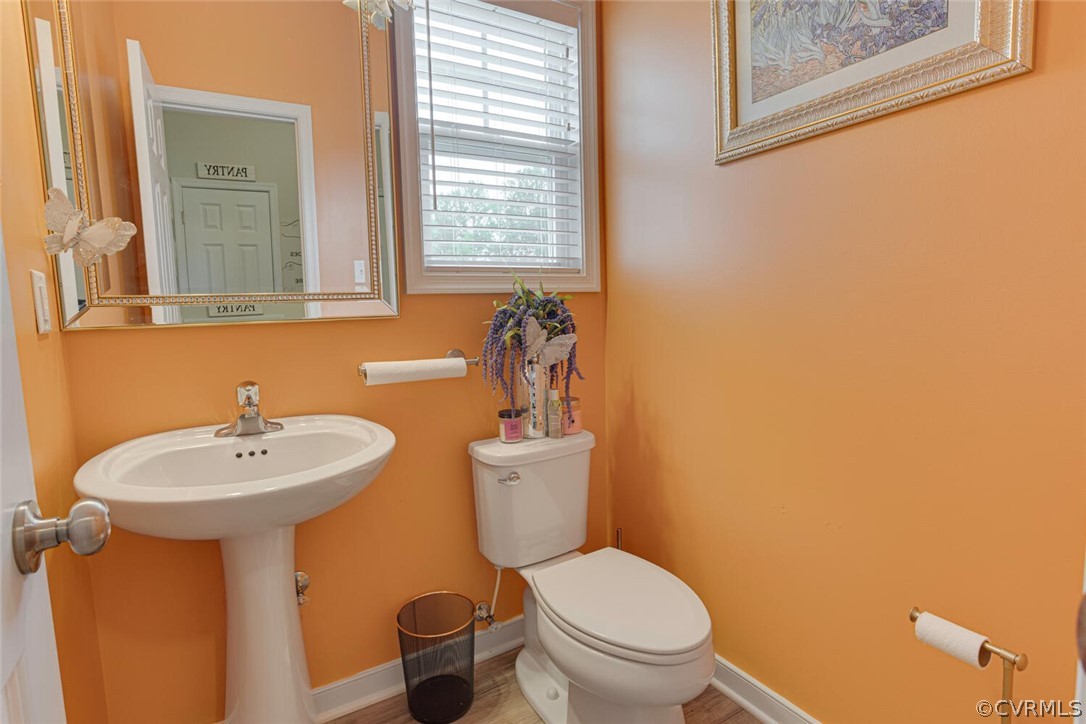 4948 Michaelwood Road Chesterfield, VA 23832 - Photo 17 of 38 Bathroom with toilet and hardwood / wood-style flo