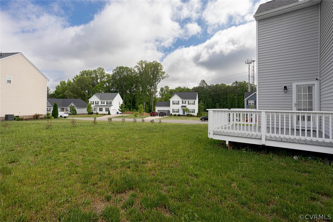 4948 Michaelwood Road Chesterfield, VA 23832 - Photo 8 of 38 View of yard featuring a deck