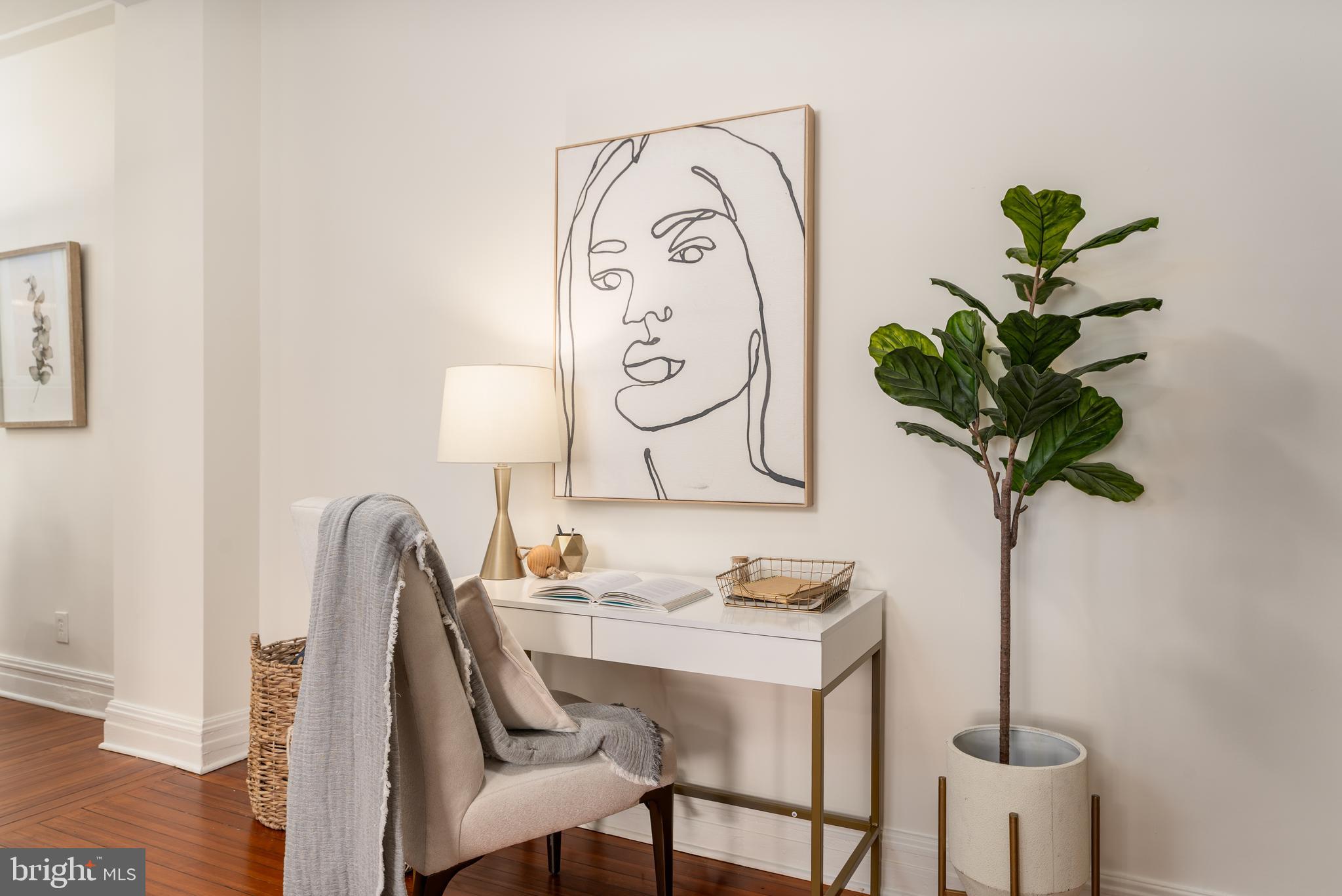 3060 16th Street Northwest, Unit 209 Washington, DC 20009 - Photo 9 of 33 a view of dining room with furniture and wooden floor