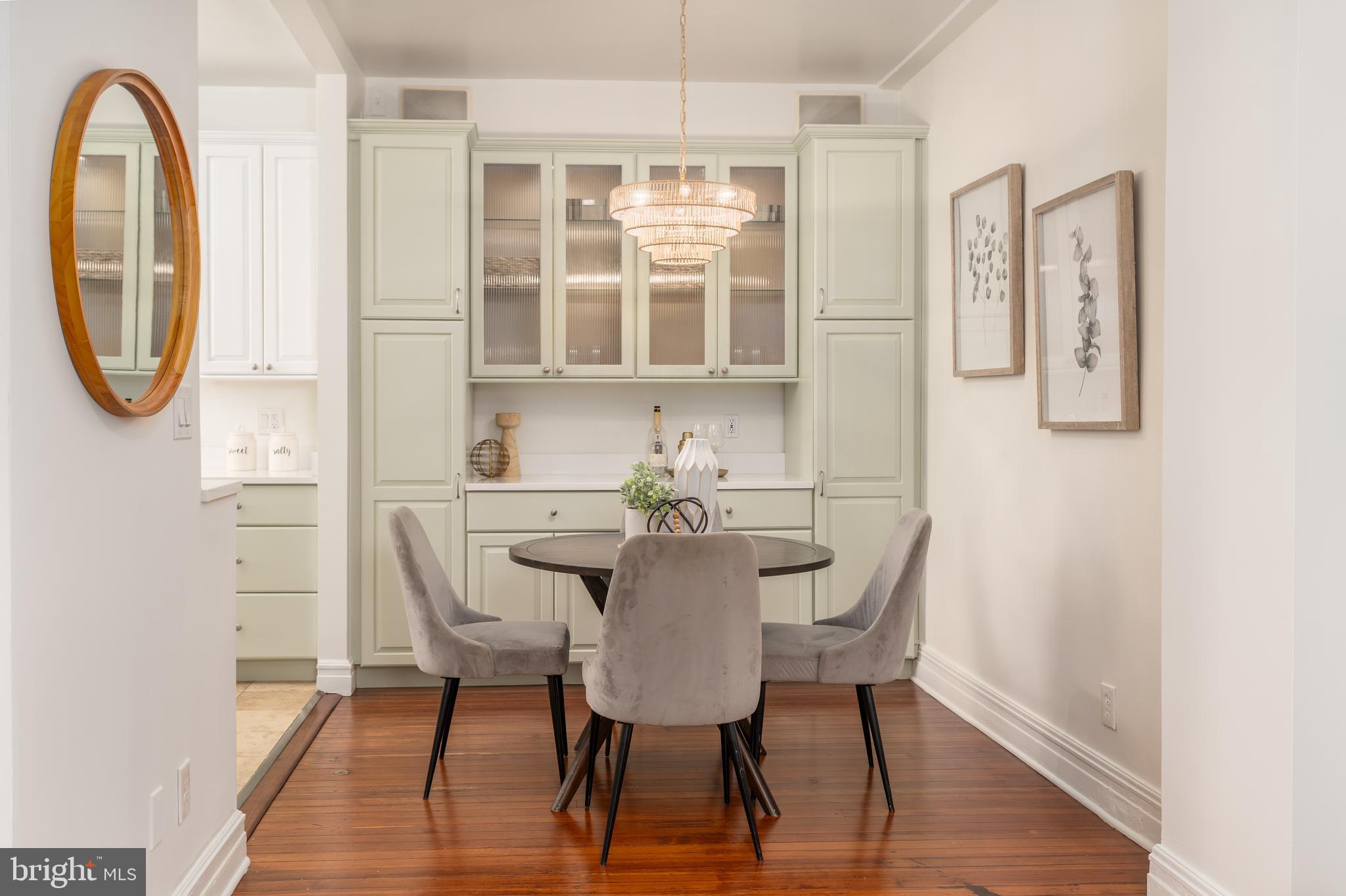 3060 16th Street Northwest, Unit 209 Washington, DC 20009 - Photo 10 of 33 a view of a dining room with furniture and wooden floor
