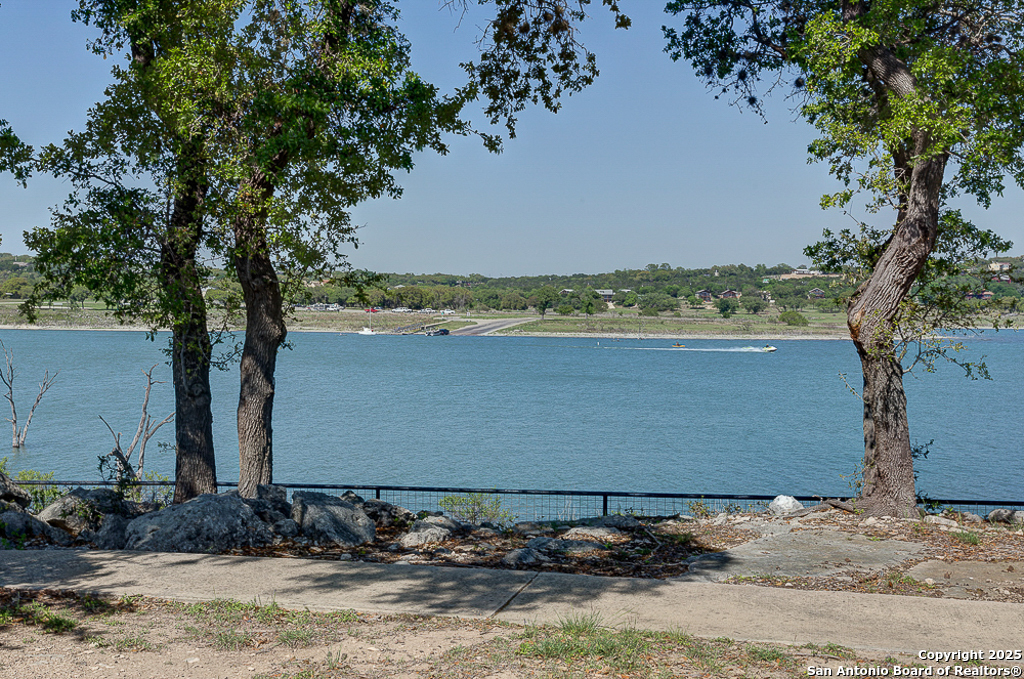 100 Sweet Clover Drive Spring Branch, TX 78070 - Photo 24 of 31 a view of a backyard of a house