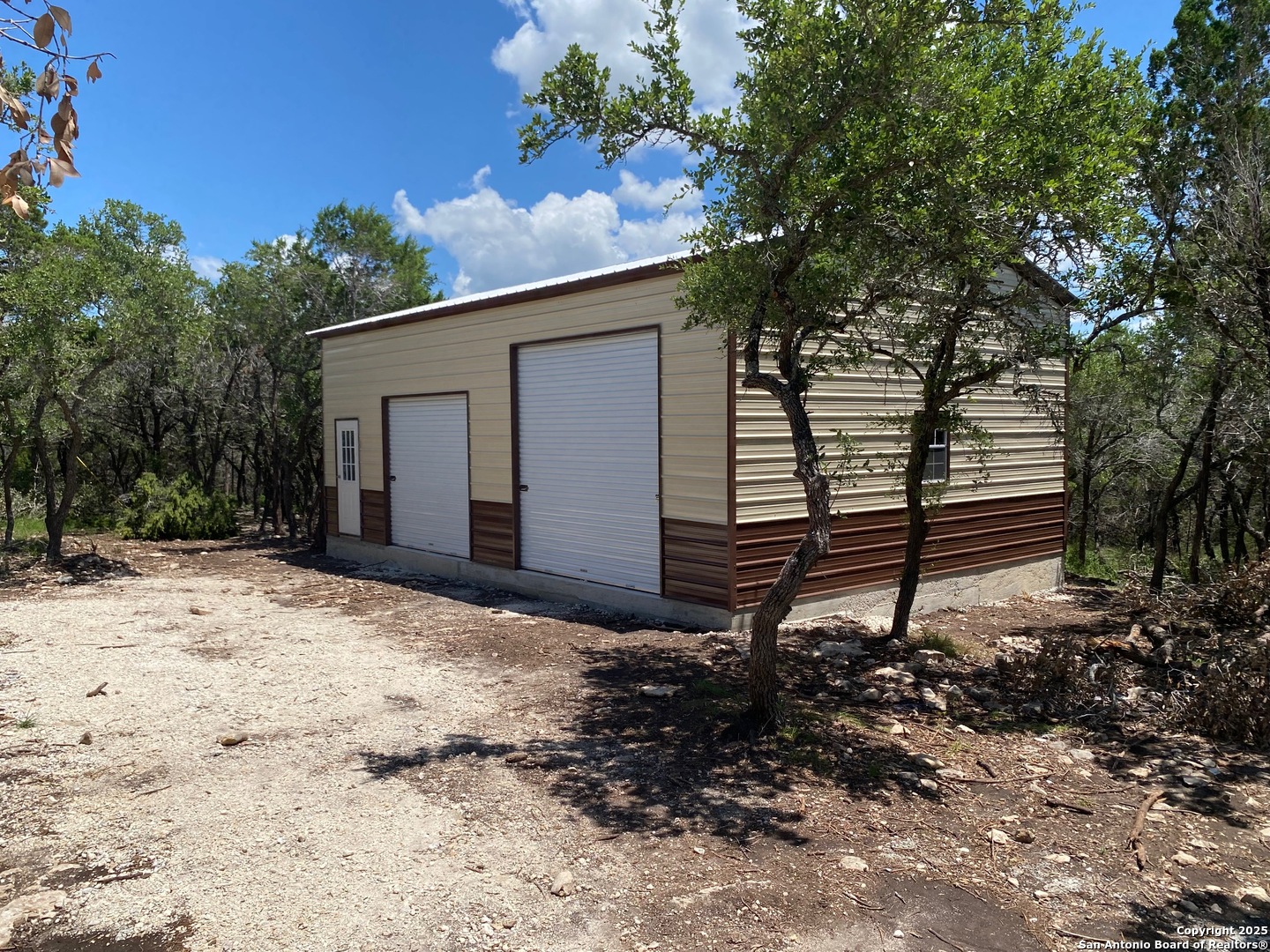 100 Sweet Clover Drive Spring Branch, TX 78070 - Photo 3 of 31 a backyard of a house with lots of green space