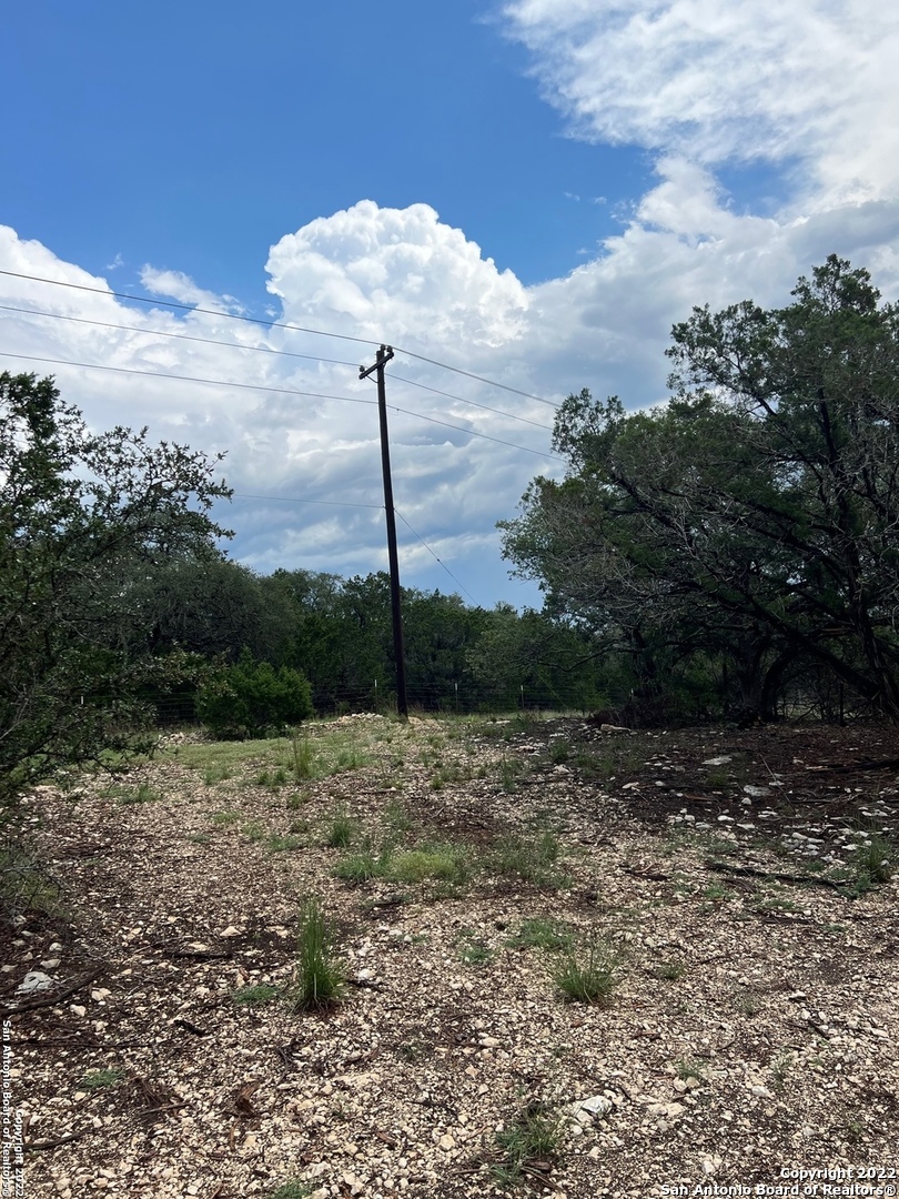 100 Sweet Clover Drive Spring Branch, TX 78070 - Photo 7 of 31 a view of a road with a yard