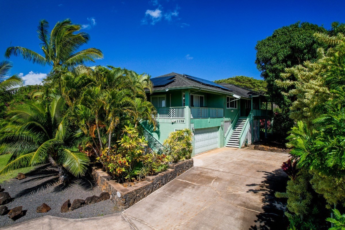 2258 Kuai Road Koloa, HI 96756 - Photo 1 of 30 a front view of a house with a yard