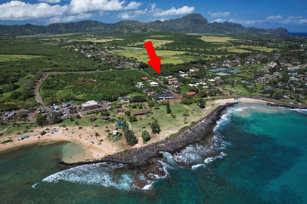 2258 Kuai Road Koloa, HI 96756 - Photo 2 of 30 a aerial view of a house with a yard and lake view