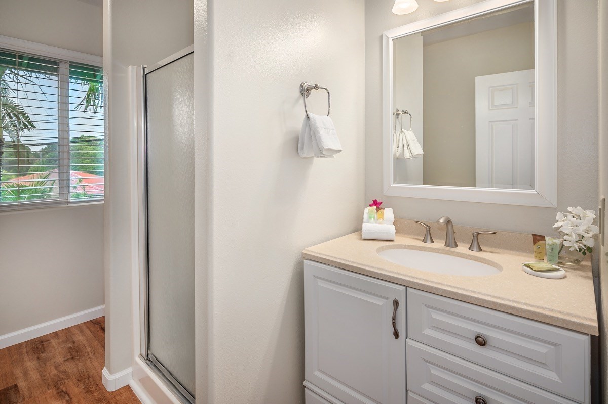 2258 Kuai Road Koloa, HI 96756 - Photo 21 of 30 a bathroom with a sink and a mirror
