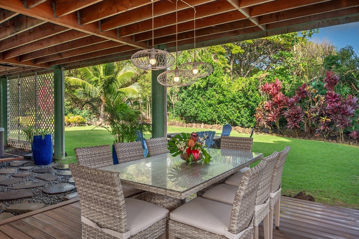 2258 Kuai Road Koloa, HI 96756 - Photo 28 of 30 a view of an outdoor dining space with a table and chairs