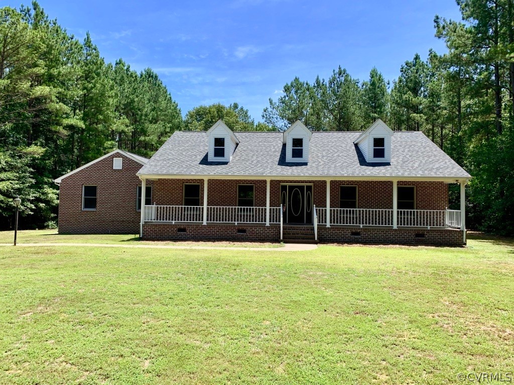 8301 Cattail Road Chesterfield, VA 23838 - Photo 1 of 31 a front view of a house with a yard