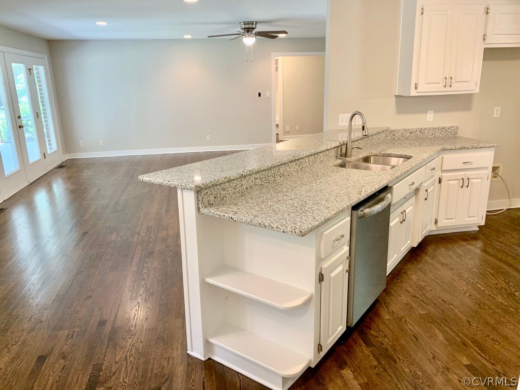 8301 Cattail Road Chesterfield, VA 23838 - Photo 13 of 31 a kitchen with a sink cabinets and wooden floor