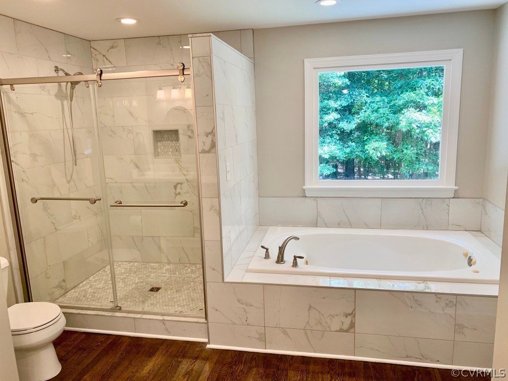 8301 Cattail Road Chesterfield, VA 23838 - Photo 19 of 31 a bathroom with a shower and a bathtub