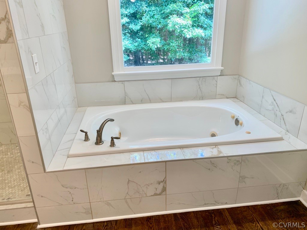8301 Cattail Road Chesterfield, VA 23838 - Photo 20 of 31 a bathroom with a bathtub