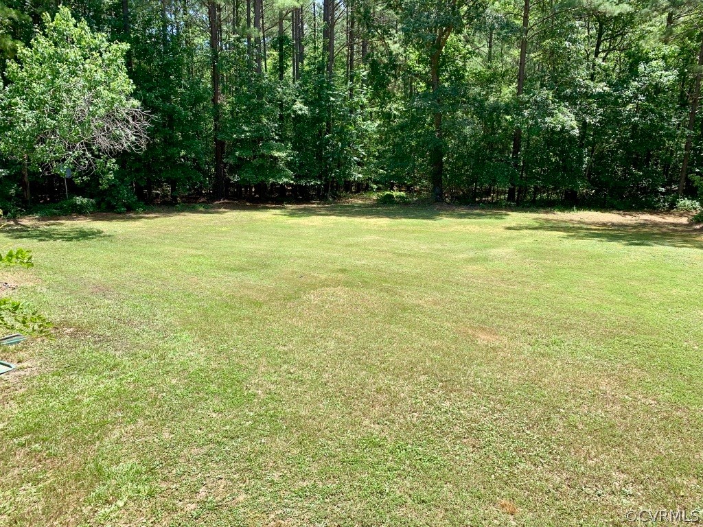8301 Cattail Road Chesterfield, VA 23838 - Photo 29 of 31 a view of an outdoor space and a yard