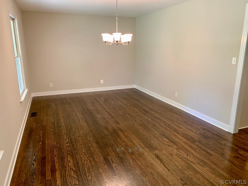 8301 Cattail Road Chesterfield, VA 23838 - Photo 6 of 31 an empty room with wooden floor and windows