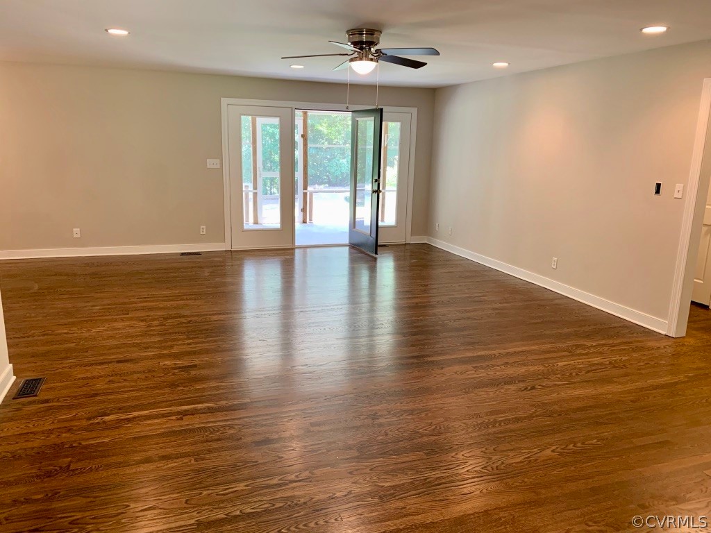 8301 Cattail Road Chesterfield, VA 23838 - Photo 7 of 31 an empty room with wooden floor and windows
