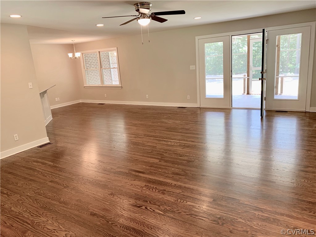 8301 Cattail Road Chesterfield, VA 23838 - Photo 8 of 31 an empty room with wooden floor and windows