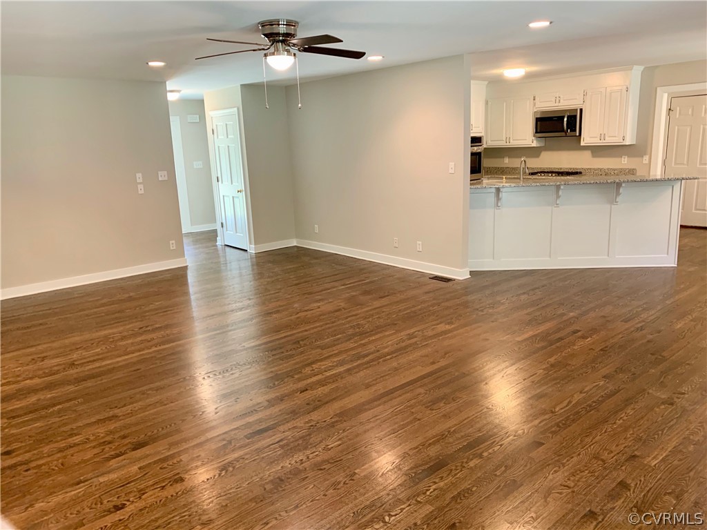 8301 Cattail Road Chesterfield, VA 23838 - Photo 9 of 31 a view of kitchen with wooden floor and a sink