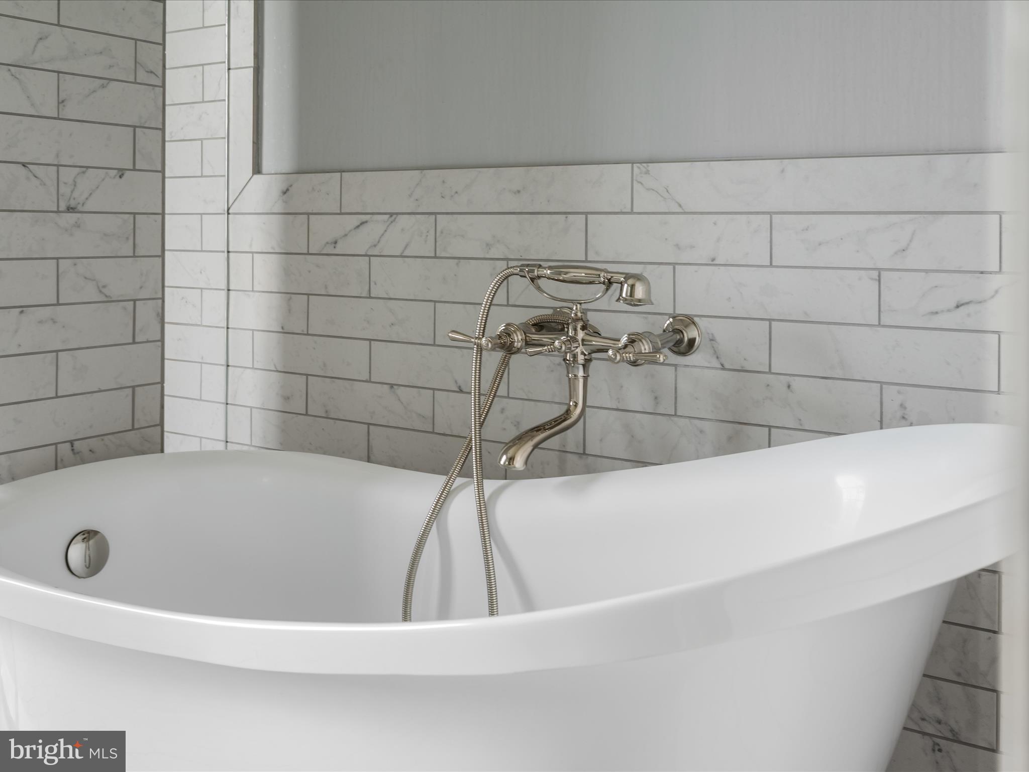 7919 Church Street Middletown, VA 22645 - Photo 24 of 48 a bathroom with a bathtub
