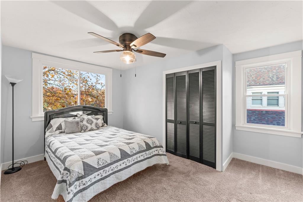 433 Green Street Homestead, PA 15120 - Photo 15 of 23 a bedroom with a large bed and a window