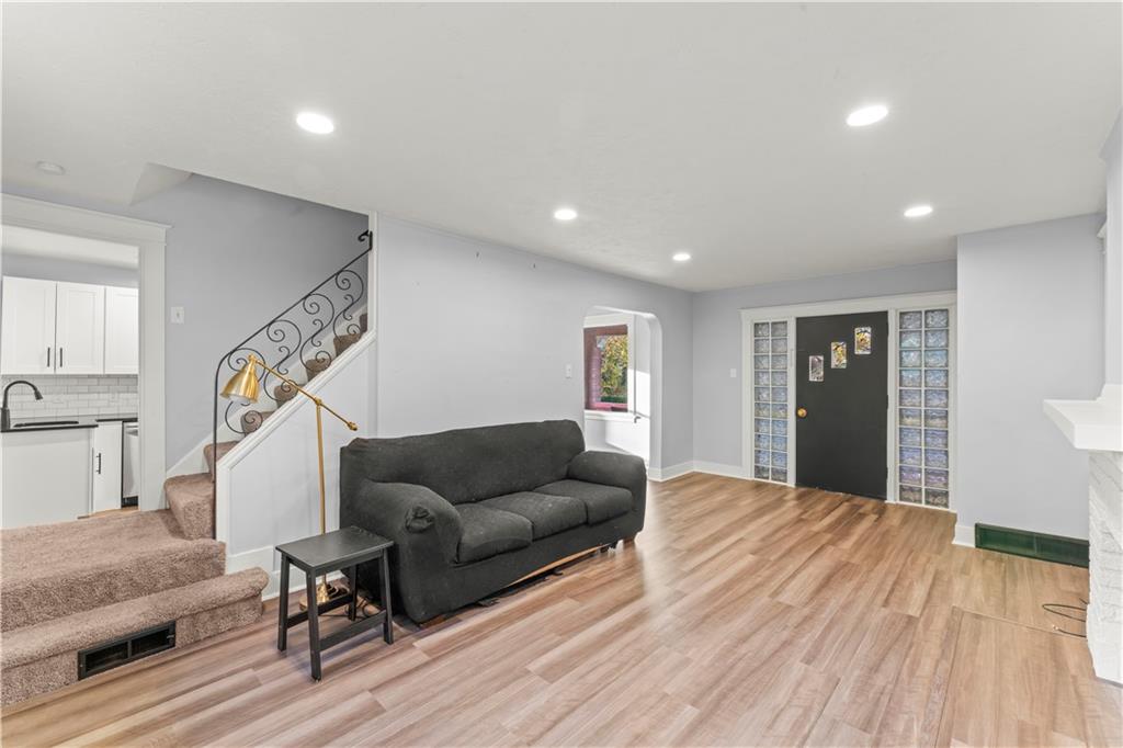 433 Green Street Homestead, PA 15120 - Photo 6 of 23 a living room with furniture and wooden floor
