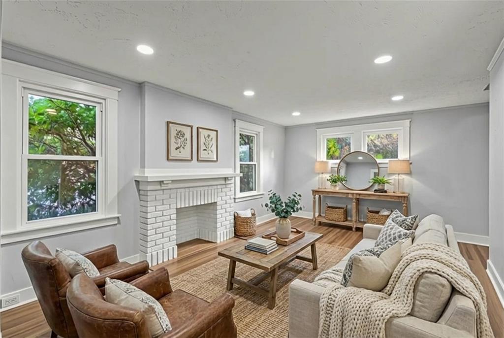 433 Green Street Homestead, PA 15120 - Photo 9 of 33 a living room with furniture and a fireplace