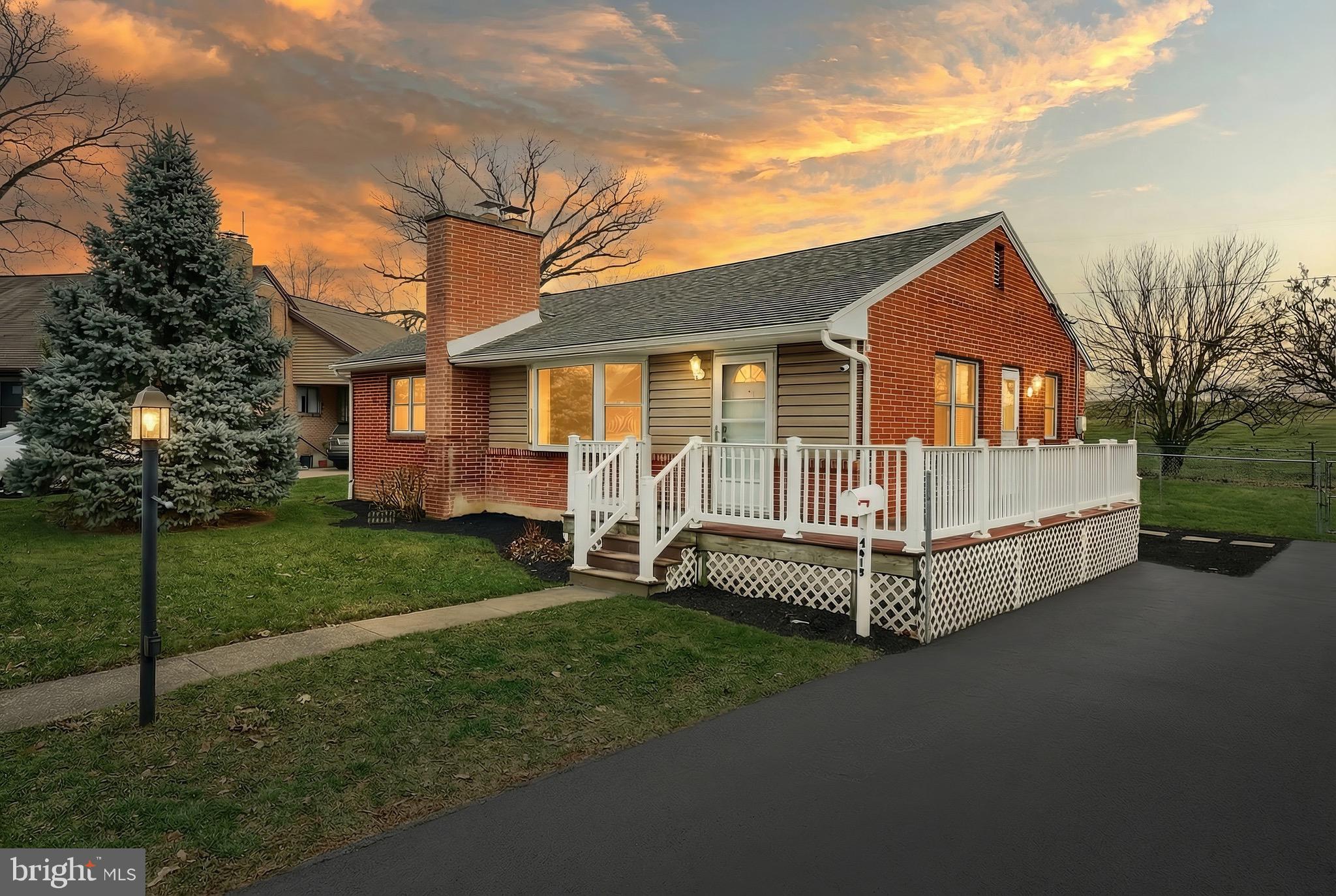 4619 South Road Harrisburg, PA 17109 - Photo 1 of 29 a view of backyard with a garden and deck