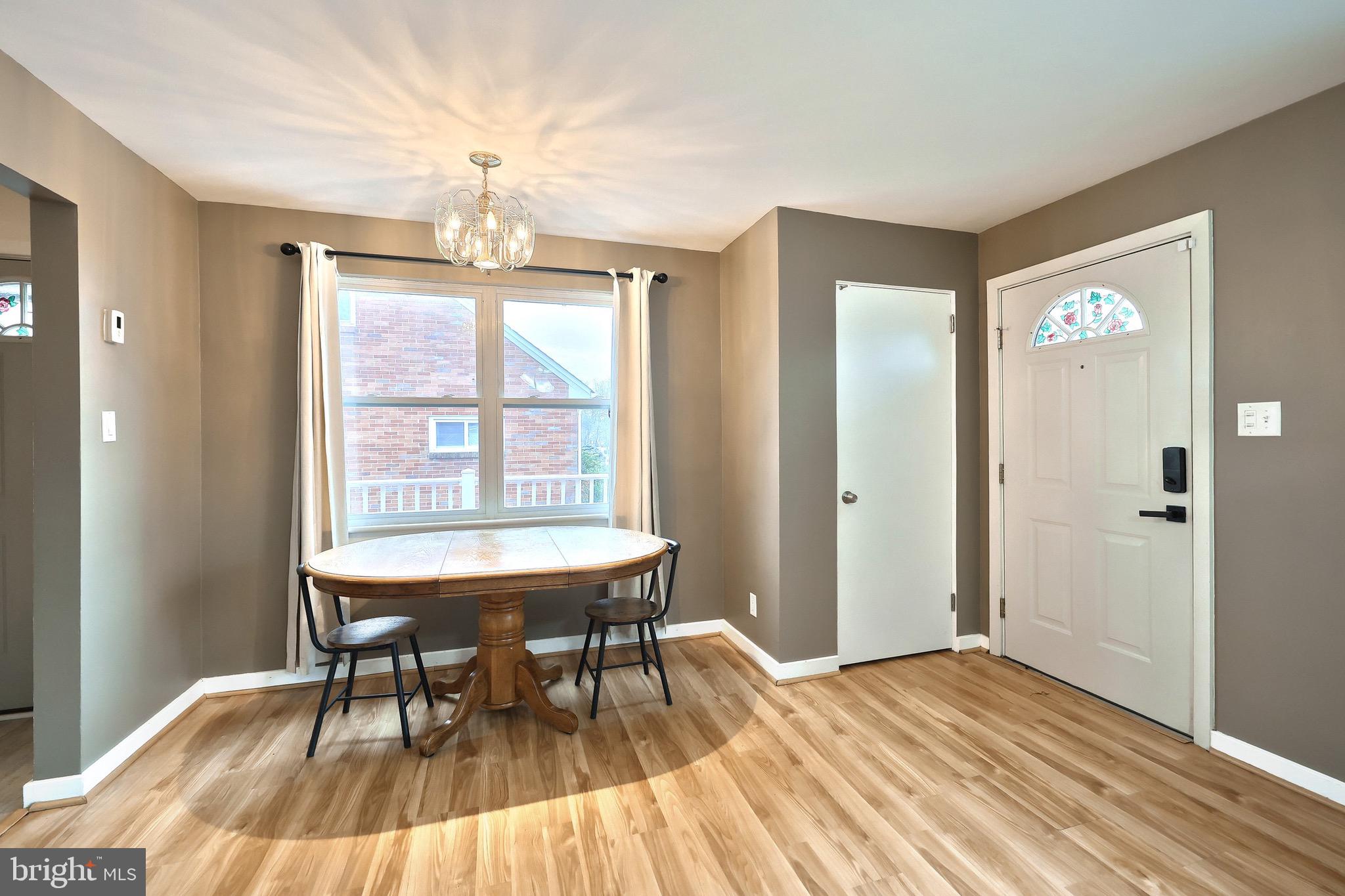4619 South Road Harrisburg, PA 17109 - Photo 12 of 29 a view of a livingroom with furniture window and wooden floor