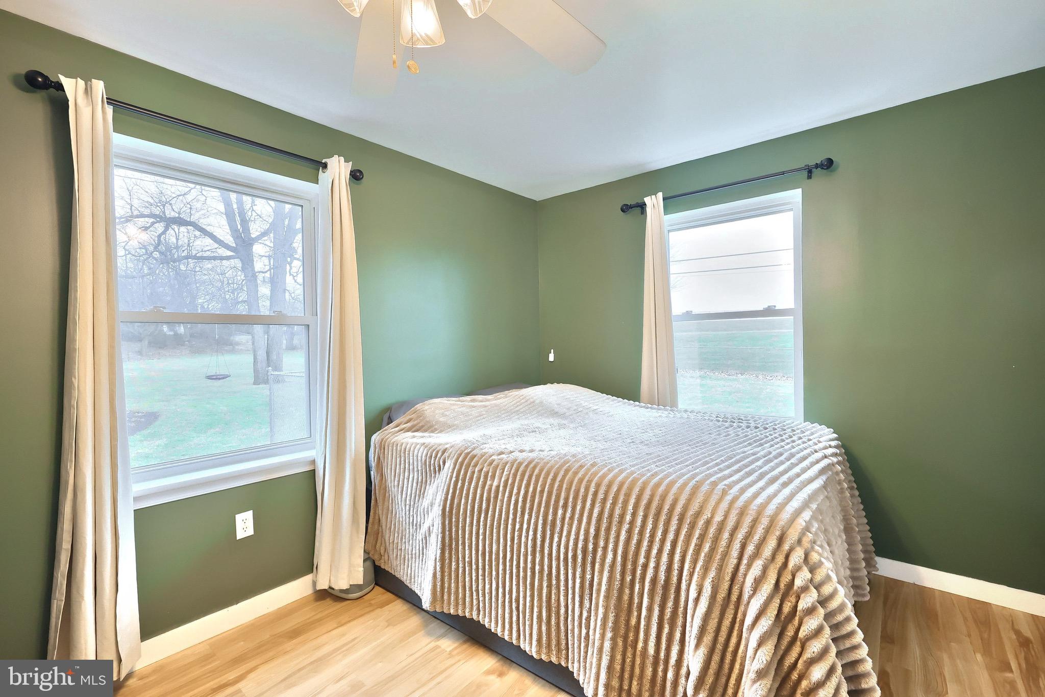 4619 South Road Harrisburg, PA 17109 - Photo 23 of 29 a bedroom with a bed and a window