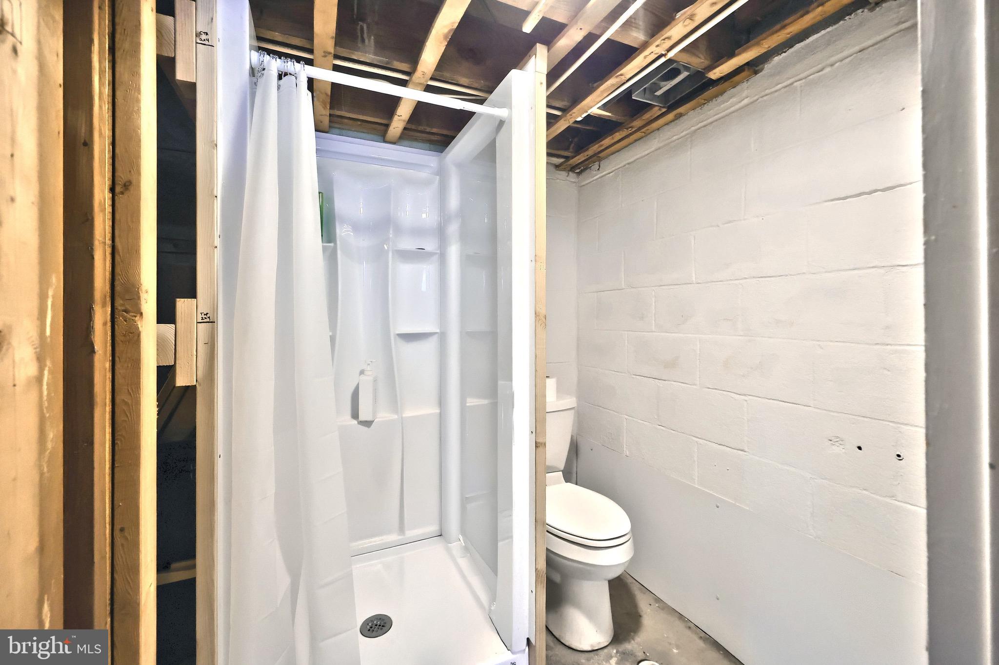 4619 South Road Harrisburg, PA 17109 - Photo 27 of 29 a bathroom with a toilet and a shower