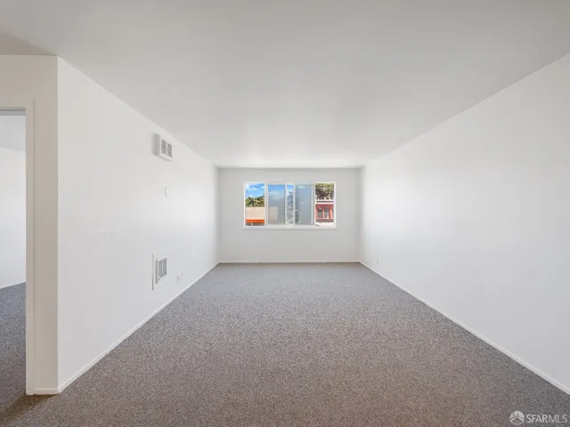 a view of a kitchen with a sink
