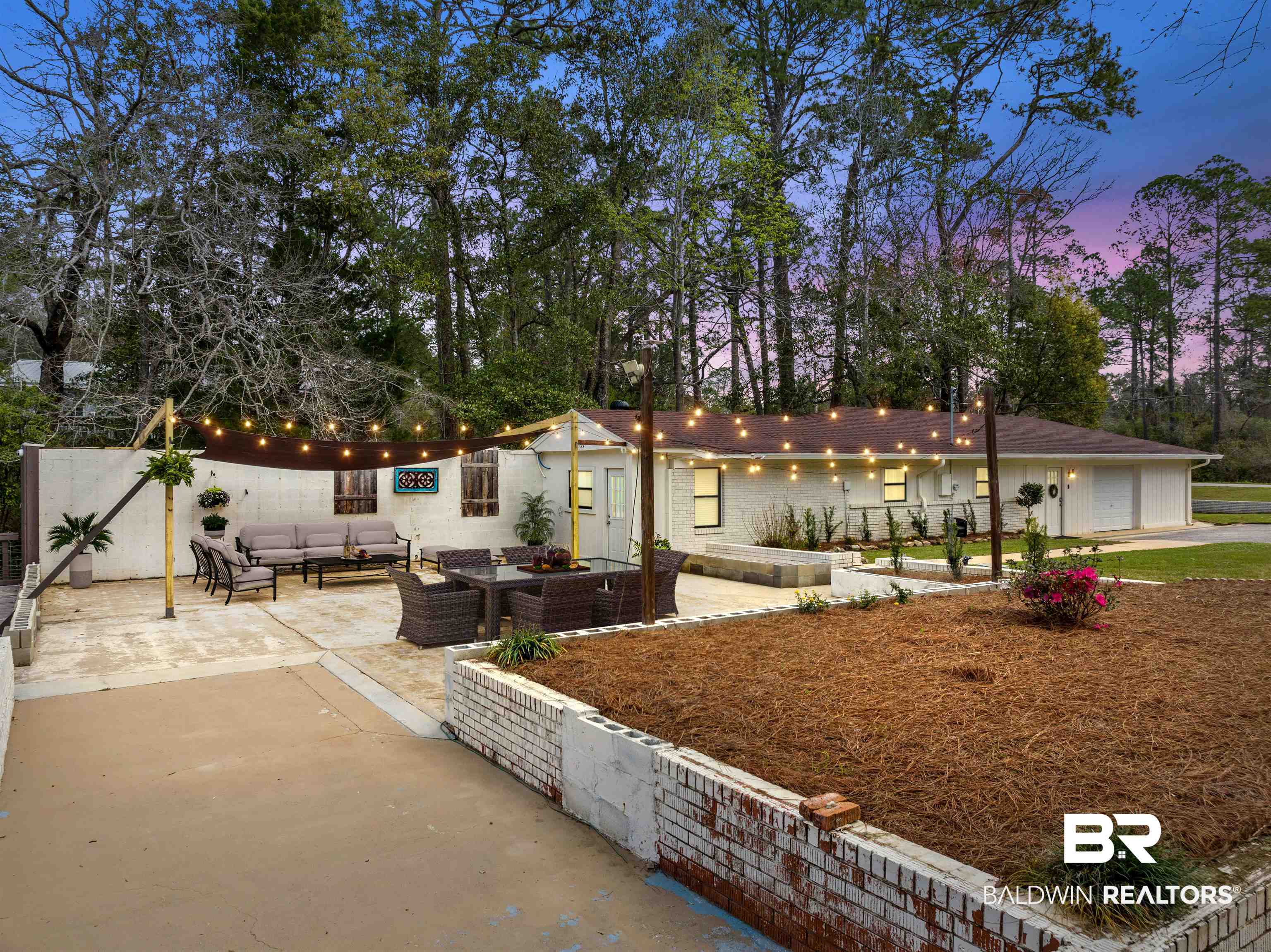 17595 River Road Summerdale, AL 36580 - Photo 2 of 29 View of front of house with a patio area and outdoor furniture
