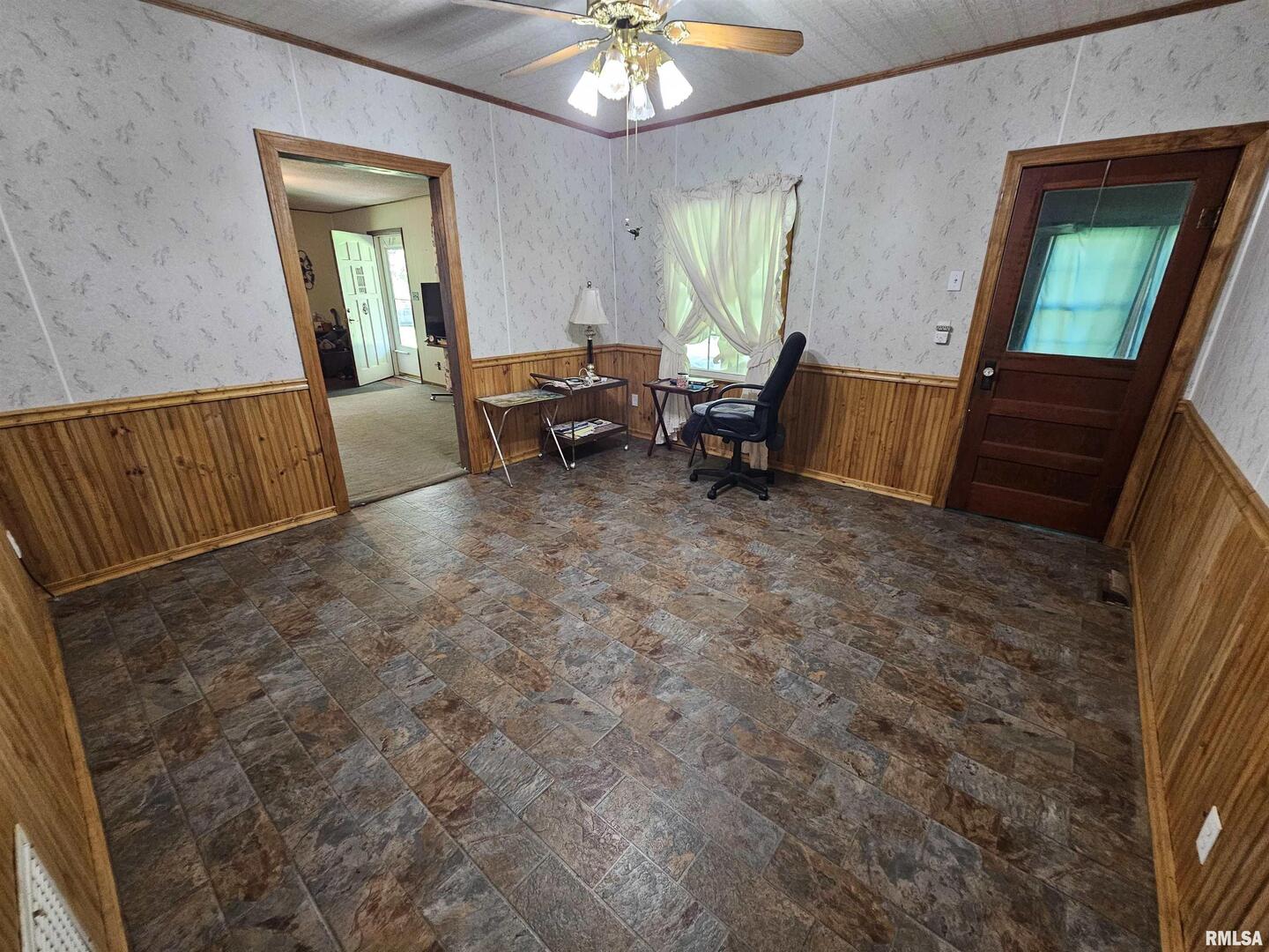 4864 Boaz Road Grand Chain, IL 62941 - Photo 11 of 32 a view of a livingroom with furniture and a flat screen tv