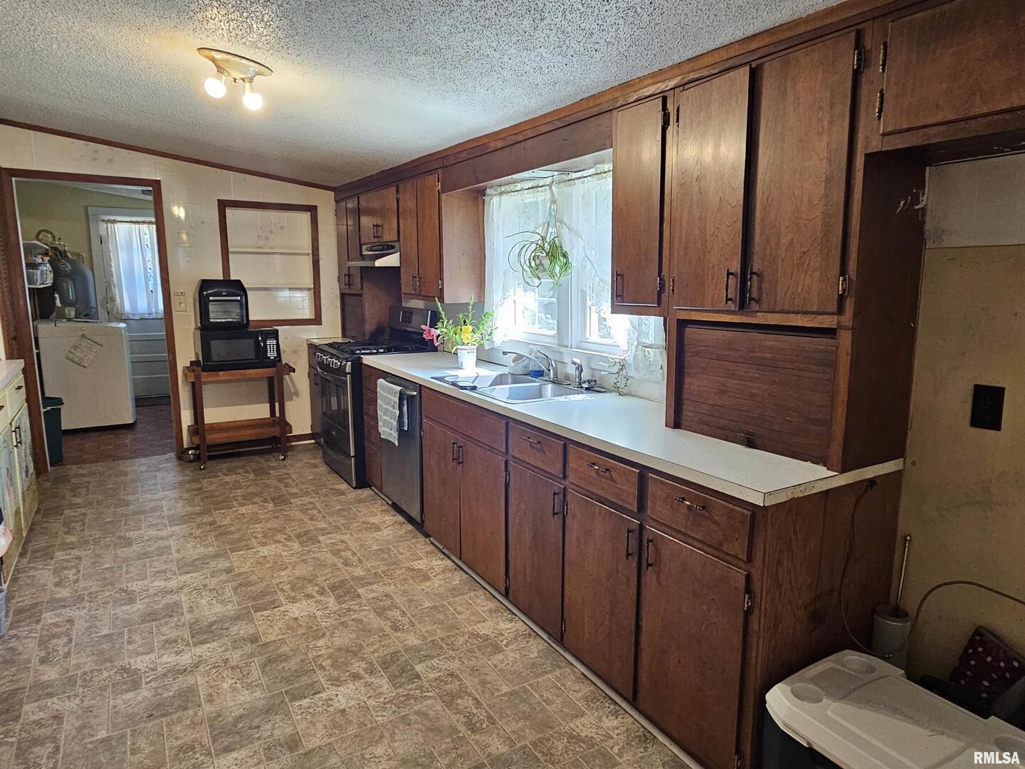 4864 Boaz Road Grand Chain, IL 62941 - Photo 14 of 32 a large kitchen with a large window
