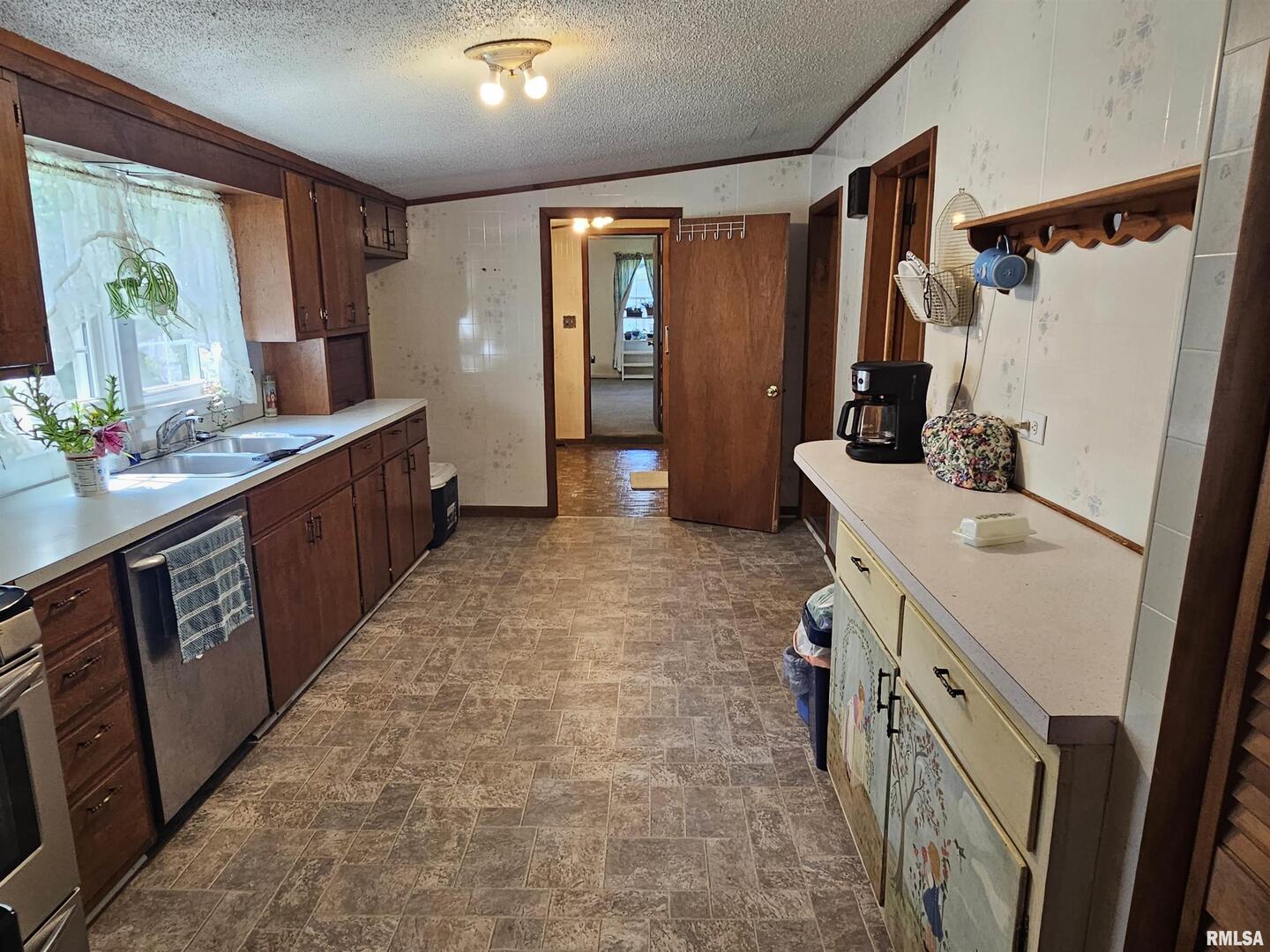 4864 Boaz Road Grand Chain, IL 62941 - Photo 15 of 32 a kitchen with a sink stove and refrigerator