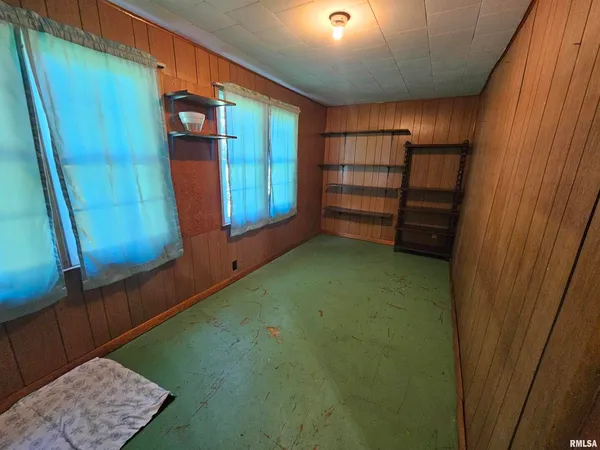 a view of room with window and closet