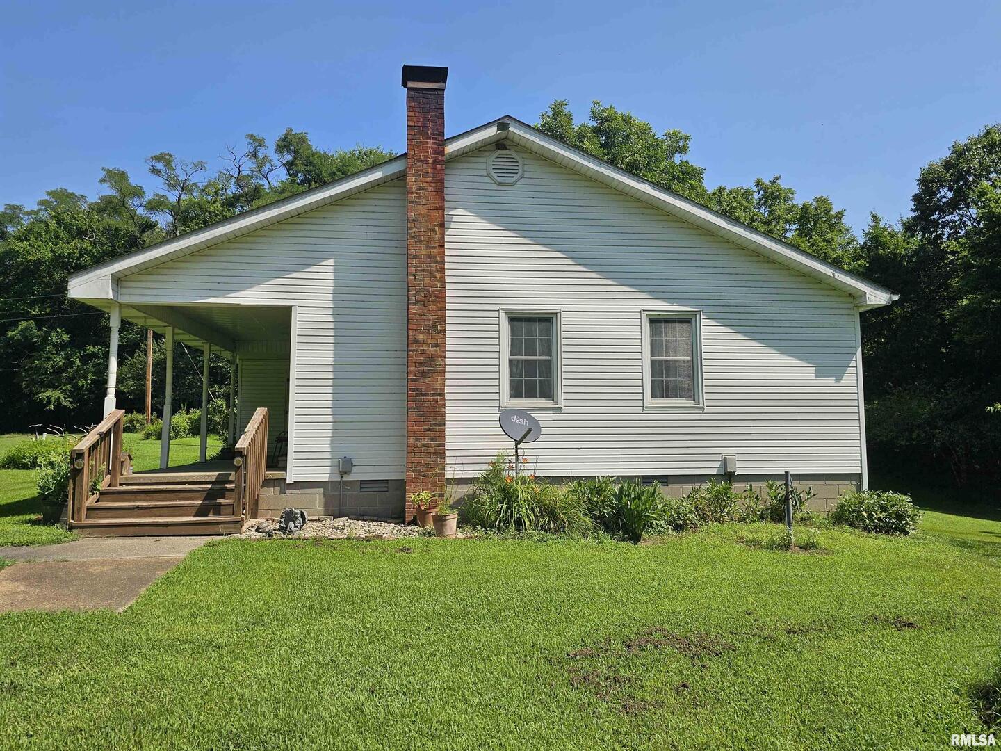 4864 Boaz Road Grand Chain, IL 62941 - Photo 3 of 32 a front view of a house with a yard