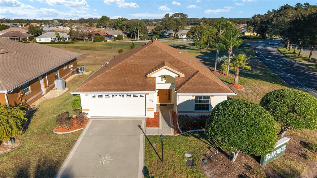17549 Southeast 115th Terrace Road Summerfield, FL 34491 - Photo 1 of 56 an aerial view of residential houses with outdoor space
