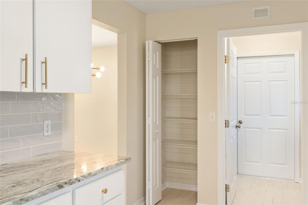 17549 Southeast 115th Terrace Road Summerfield, FL 34491 - Photo 12 of 56 a view of kitchen with granite countertop cabinets