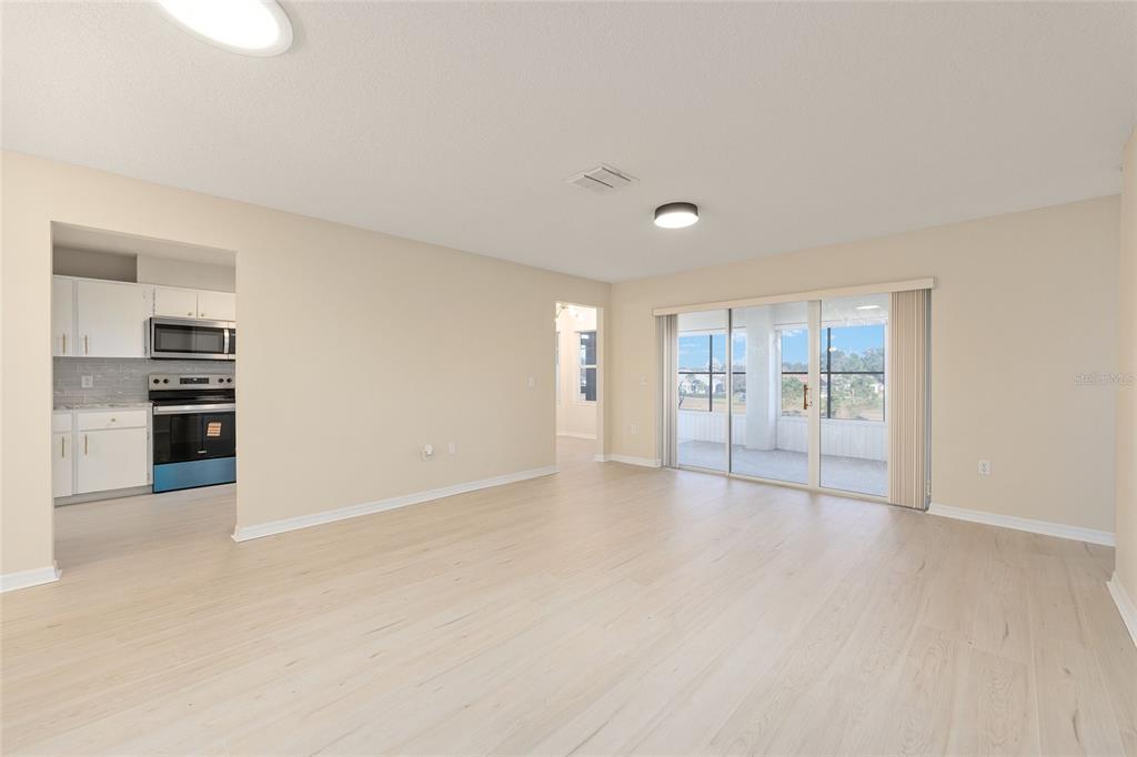 17549 Southeast 115th Terrace Road Summerfield, FL 34491 - Photo 19 of 56 a view of an empty room with a window