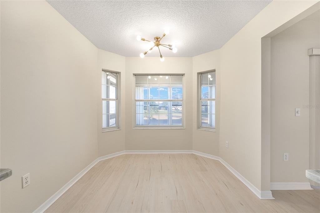17549 Southeast 115th Terrace Road Summerfield, FL 34491 - Photo 23 of 56 a view of an empty room with a window