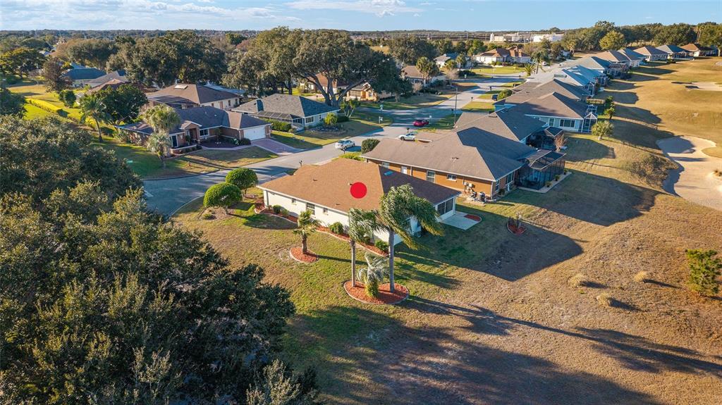 17549 Southeast 115th Terrace Road Summerfield, FL 34491 - Photo 48 of 56 an aerial view of residential houses with outdoor space