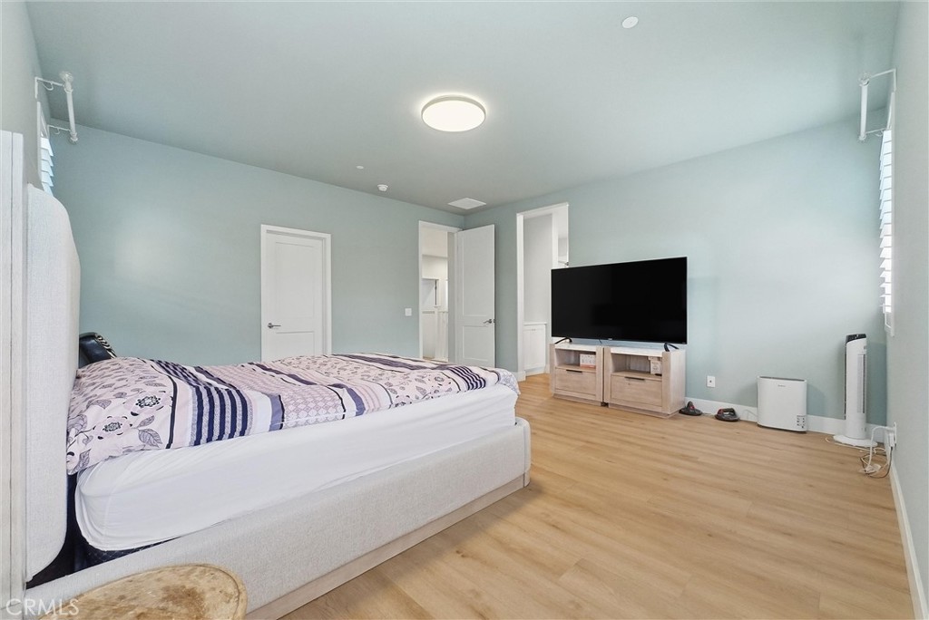 15828 Kingston Road Chino Hills, CA 91709 - Photo 15 of 28 a living room with furniture and a flat screen tv