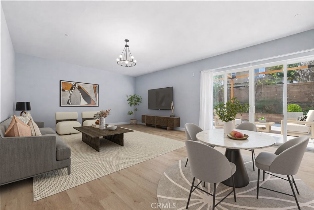 15828 Kingston Road Chino Hills, CA 91709 - Photo 2 of 28 a living room with furniture and a flat screen tv